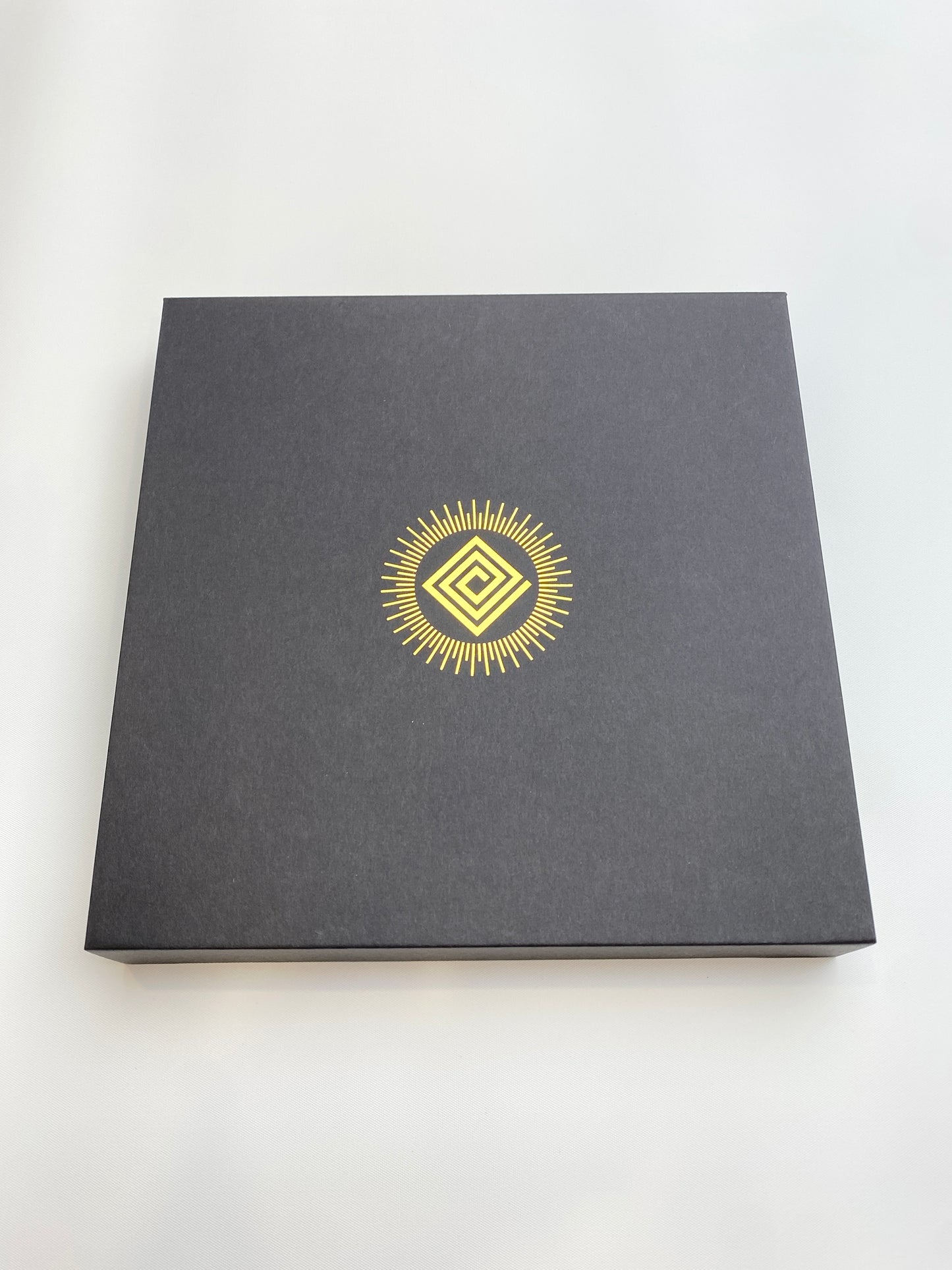 Cryptik Loveletter silk scarf box top with logo