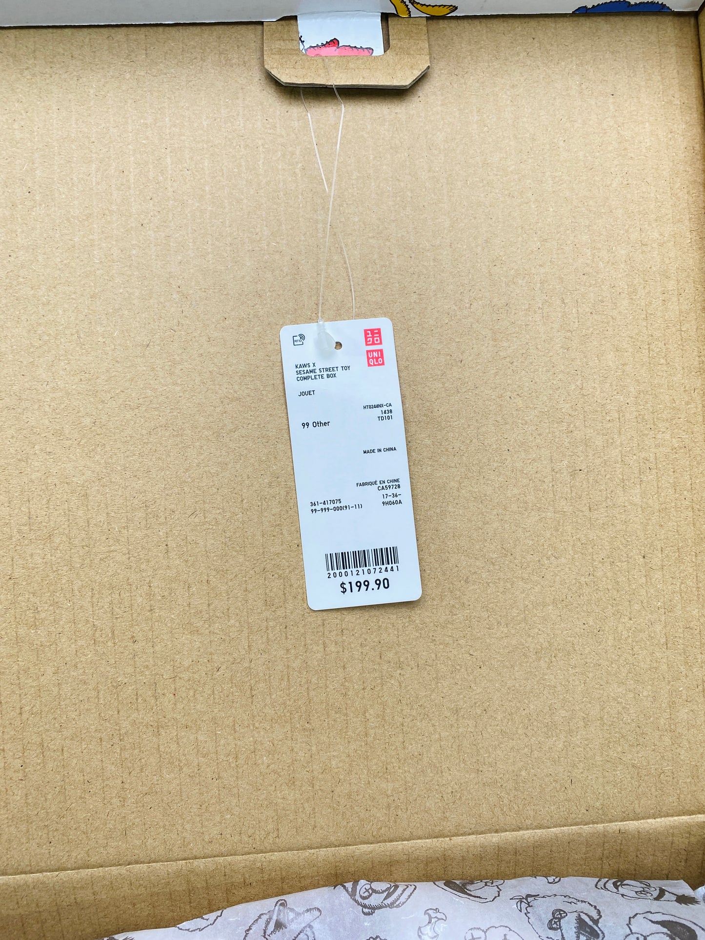 KAWS Uniqlo Sesame Street Plush Toy Box Attached Price Tag