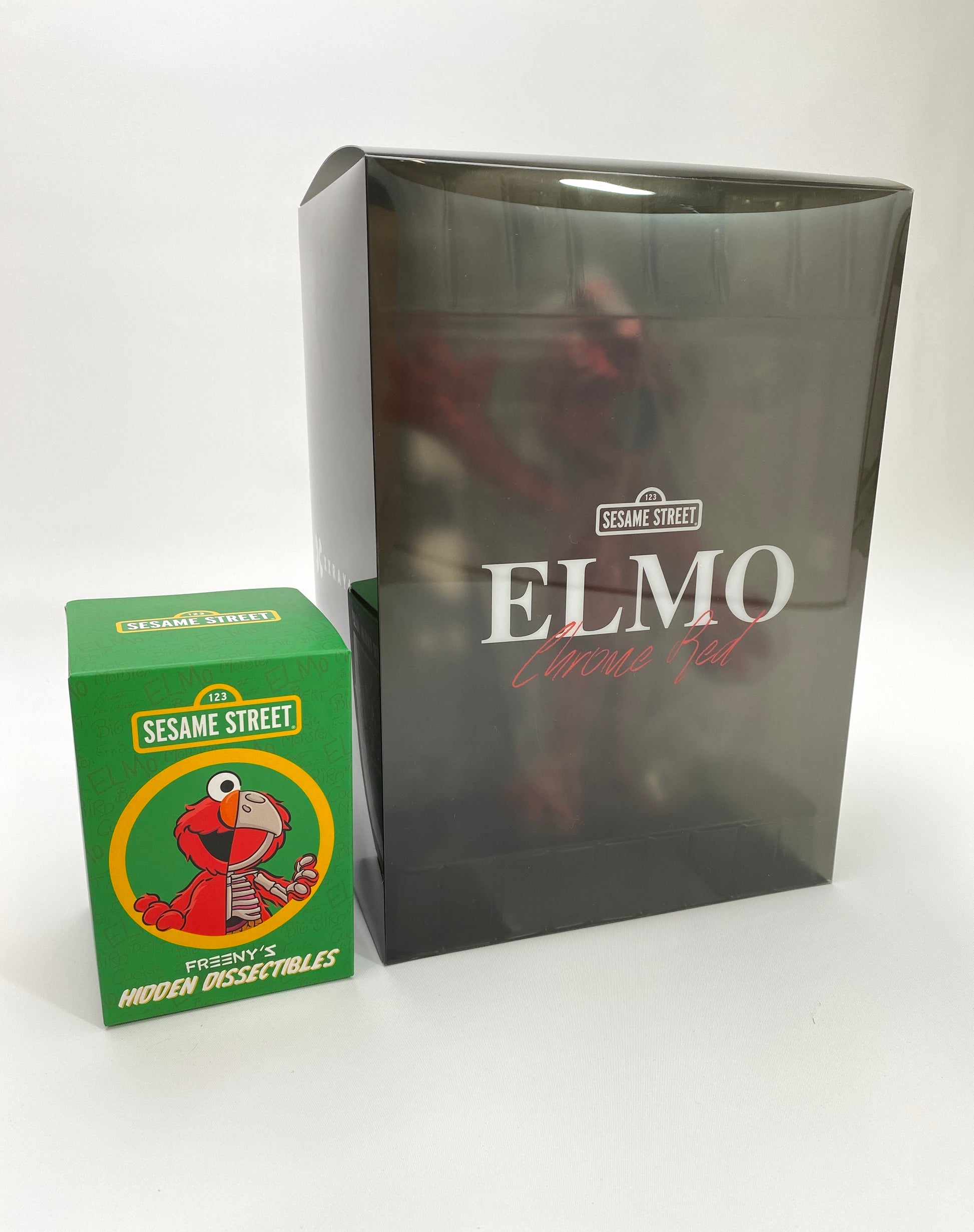 Mighty Jaxx XXRay Jason Freeny Elmo Chrome Red and Clear Glitter Box Front